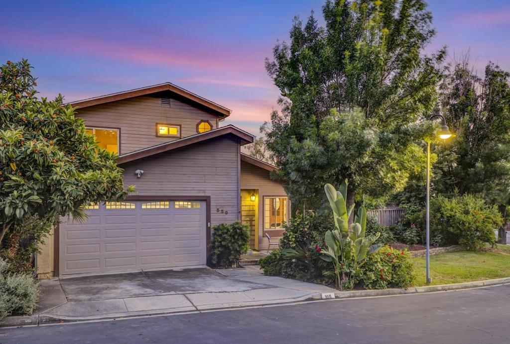 Welcome to Bayview Park Drive, a 4-bedroom 3 bath home nestled below the hills in Milpitas. Enjoy double high ceilings in the elegant living space in this freshly painted home with recessed lighting and a romantic fireplace and hardwood floors. Flowing into a open kitchen with new quartz countertops and ample storage is a great room and formal dining. Also, on the bottom floor is the primary bedroom with a view of the lush backyard with many fruit trees...The backyard is a wrap around with a surprising amount of space and lime, lemon, orange, loquat, persimmon and pomegranate fruit trees, overflowing jasmine, and blooming roses encasing you in heavenly scents. Recently replaced newer roof. Three bedrooms upstairs are all oversized with room for king beds and desks or lounging spaces with a deck overlooking the backyard. Award winning Milpitas schools including William Burnett Elementary (9/10 test score rating) and Milpitas High. Extra storage in the garage with a built-in attic storage with ladder. The home is across from the sparkling community Pool, and a playground. The community is quiet and private with walking paths and extra vehicle storage for all the RV, Boat, or kayak! Make this lovely spacious home yours today!