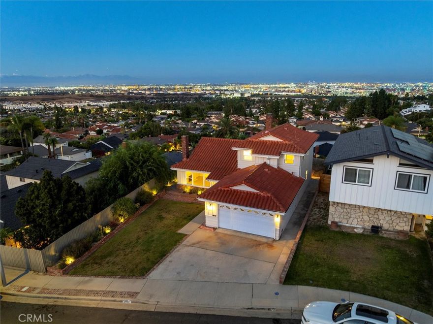 Incredible sweeping 180 degree views from Los Angeles Harbor to Downtown Los Angeles and beyond. You can see the Vincent St. Thomas Bridge, Mountains, and city lights  from this rare view home. Newly remodeled and upgraded the home is located on a cul-de-sac corner view lot nestled below Miraleste School. Open family room with access to kitchen and fireplace, access to backyard and panoramic view of harbor/city . There is also a large living room with second fireplace, two large bedrooms with views upstairs and downstairs. Upstairs with 2 bedrooms and jill/jack bathroom with jacuzzi bathtub. Large two car garage with washer/ dryer included and extra refrigerator in garage. New dual paned windows, new wood laminate flooring, freshly painted inside and out, tons of closet space, central heat and air.  Great school district in Rancho Palos Verdes, quiet but friendly neighbors and centrally located in walking distance to local grocery stores/shops.