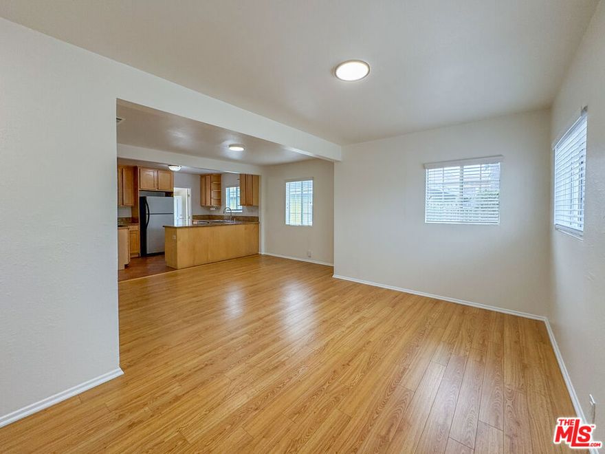 Welcome to this inviting and thoughtfully designed 2-bedroom, 2-bathroom home located in the vibrant city of Hawthorne. Perfectly blending comfort and functionality, this residence features an open-concept living room and kitchen, bathed in natural light from large windows that create a warm and airy atmosphere. A central hallway leads to a well-proportioned bedroom and a full bathroom with a shower/tub combo, ideal for guests or family. The spacious primary bedroom includes a unique bonus room that can be used as a private office, nursery, or oversized walk-in closet. It also features an en suite full bathroom for added privacy and convenience. Outside to enjoy the expansive backyard, perfect for weekend barbecues, entertaining guests, or simply relaxing in the California sunshine. The long driveway offers plenty of off-street parking, and a dedicated laundry area near the kitchen includes hookups for your own washer and dryer. Additional features include central A/C for year-round comfort. Tenant is responsible for all utilities except gardening services. No pets allowed.