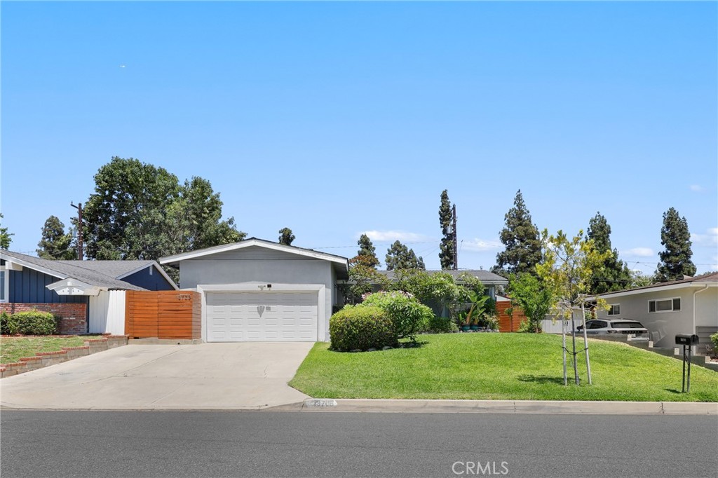 Welcome to 13708 El Espejo Road, a beautifully upgraded and meticulously maintained move-in ready pool home nestled in a peaceful La Mirada neighborhood. From its lush curb appeal to its thoughtfully renovated interior, this home is the perfect blend of comfort, style, and convenience. The front yard features manicured landscaping, a mature peach tree, and a sprinkler system to keep everything green and thriving. Inside, you'll find neutral designer paint tones, recessed lighting, durable wood and tile flooring, dual-pane windows, a reverse osmosis water softener system, and all-new copper plumbing throughout. The living room offers a warm and inviting atmosphere with a gas fireplace with raised hearth and a modern dual ceiling fan. The remodeled kitchen is both functional and stylish, with white cabinetry, a spacious sink, bar seating, and access to an indoor laundry room with extra storage. Adjacent to the kitchen, the dining area features soaring vaulted beamed ceilings and a sliding glass door that leads to the backyard. Another feature of the home is the expansive bonus room with a separate entrance, vaulted ceilings, skylights, a stacked stone accent wall, and a sliding barn door for added character—ideal for a home office, guest space, or creative studio. The home offers three generously sized bedrooms and two tastefully updated bathrooms—one with a tub/shower combo and the other with a walk-in shower—along with two hallway closets providing ample storage. Step into your private backyard oasis complete with block wall fencing, an in-ground swimming pool, and a relaxing hot tub spa, ready for your personal touches. Conveniently located near top-rated schools, La Mirada Regional Park, La Mirada Golf Course, the La Mirada Theatre for the Performing Arts, and a variety of shopping and dining options, this home also offers easy access to the 5 and 91 freeways, making commuting to Orange County or Los Angeles a breeze. Don’t miss the opportunity to make this exceptional property your forever home—schedule your private showing today.