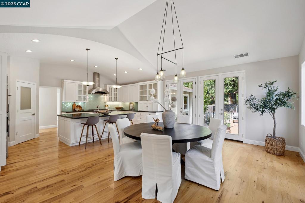 Open Sun 1-4. Understated from the front & spectacular inside, this timeless Burton Valley solar-equipped home enjoys exquisite touches & sunlit living spaces. The eat-in chef’s kitchen impresses w/high-end appliances: 6-burner Wolf range, Liebherr dual refrigerator/freezer, Wolf steam oven plus an expansive island, & walk-in pantry. It opens to a living room, family room, and a spacious dining area surrounded by glass and French doors that connect to the backyard. The serene primary suite with coffered ceiling, walk-in closet, and spa-like bath has sliding doors that open to a poolside yard with saltwater sport pool, waterfall, outdoor shower & pool house. Additional features: 190 SqFt. studio/office with A/C, 107 SqFt. pool house/office, storage shed, and an outdoor kitchen with BBQ. Ideal location with quick access to the Lafayette-Moraga trail, a block from Burton Valley Elementary and the Lafayette Community Park (& pickleball courts!), & down the street from Rancho Swim & Tennis Club.