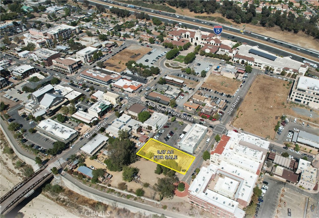 The offering consists of one legal parcel totaling approximately 0.27 acres (+/- 11,761 square feet) of land located on 3rd Street, just west of its intersection with Old Town Front Street in the heart of Old Town Temecula. The property sits adjacent to the Old Town Pub and is across the street
from The Warehouse at Creekside and Front Street Plaza. Additionally, it's located in the Old Town Specific Plan (SP-5) within the Downtown Core designated area. This district is intended to provide uses that support pedestrian oriented and mixed-use developments that accommodate a variety of land use focused on service oriented businesses. The height allowance is four stories and residential development between 40-70 DU/AC is also permitted with certain restrictions. The specific plan allows for favorable development standards and parking requirements (if any) are determined by the proposed land use.