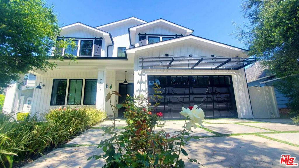 Located in Beverlywood HOA, this six-bedroom home blends clean lines with easy modern living. Sunlit rooms open to a landscaped yard with pool and spa. Outdoor kitchen with BBQ, full butler's kitchen inside, and whole-home automation. Wide-plank oak floors and custom chandeliers shape the main spaces. Primary suite with dual walk-in closets and calm greenbelt views. Discreet, advanced security. Oversized laundry with XL washer and dryer. Smart built-ins and real storage throughout.