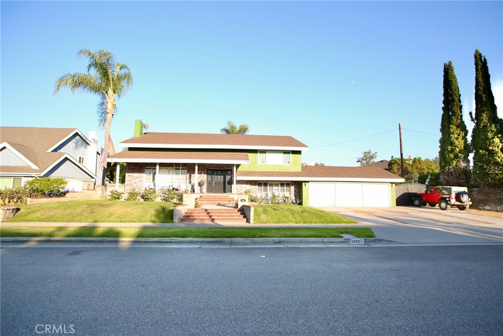 Welcome to this beautifully maintained 4 bedroom 3 bathroom home featuring fresh exterior paint, new water line throughout and a recently updated salt water pool with a new heater! Perfect for relaxing or entertaining!! Step inside to a grand 10 foot staircase that adds to the wow factor of this home. Conveniently located near major freeways 91, 55, and 22, top-rated schools, and popular shopping centers, this home offers both comfort and accessibility. Don't miss this gem in a highly desirable neighborhood.