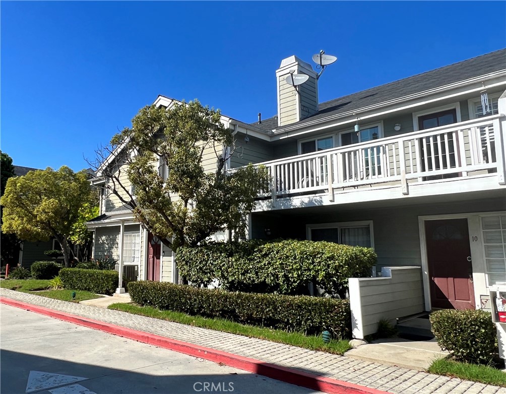 Welcome to your Beautiful Contemporary home in the Lush Resort Style Condo Community of Laurelwood! This clean Gated Complex has easy access to all Freeways 110, 405 and 91 fwy. The community beautifully maintains the Landscaping, including the Pool, Spa and Clubhouse. This home has been well Maintained, Renovated and Upgraded throughout the years. Quartz Countertops, Tile Flooring, Recess Lighting. Enter the front door and experience the limitless Vaulted Ceilings and Fresh Paint. The Open Floor Plan concept blends together the living area (with fireplace), dining room, and kitchen seamlessly. The kitchen has been upgraded with new flooring and quartz countertops with a beautiful backsplash to top it off. All appliances are included in the sale except for the refrigerator. The spacious balcony sits off the living room area and allows for the perfect indoor/outdoor feel. All bedrooms are well sized! The Owners Suite includes an en-suite. The ground level features title flooring, washer / dryer enclosures and the garage entrance. The two car (2) Garage is attached to the home at ground level. All furniture is available for sale. This is a must see hidden gem!