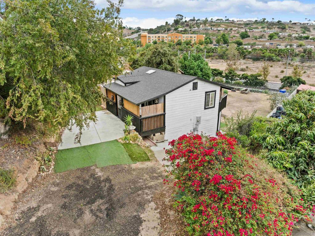 Opportunity Home In Prime Central San Diego! Discover endless potential in this unique property ideally located in the heart of Central San Diego. Situated on an expansive 16,000 sq. ft. lot zoned RX-1-1, this upgraded home is a rare opportunity to live, invest, and redevelop in one of the city’s most convenient areas. The main floor features a spacious living room, a remodeled kitchen, an updated bathroom, and one bedroom—all complemented by a large deck perfect for entertaining or relaxing outdoors. Meander down the spiral staircase to discover, a versatile open-concept studio offers an additional bedroom, kitchenette (no stove), updated bath, and private entrance—ideal for multigenerational living, guests, or rental potential. Additional highlights include a separate laundry room, newer roof, dual-pane windows, low-maintenance landscaping, and ample parking space for multiple cars, an RV, trailers, or even a boat. With its large lot and flexible zoning, there’s room to build an ADU or additional units to maximize value. Enjoy neighborhood views and a location just minutes from the Euclid redevelopment area, downtown San Diego, and the beautiful bayfront. Whether you’re looking for a home to customize or an investment with incredible upside, this property delivers on all fronts. Come See The Potential—And Make It Your Own!