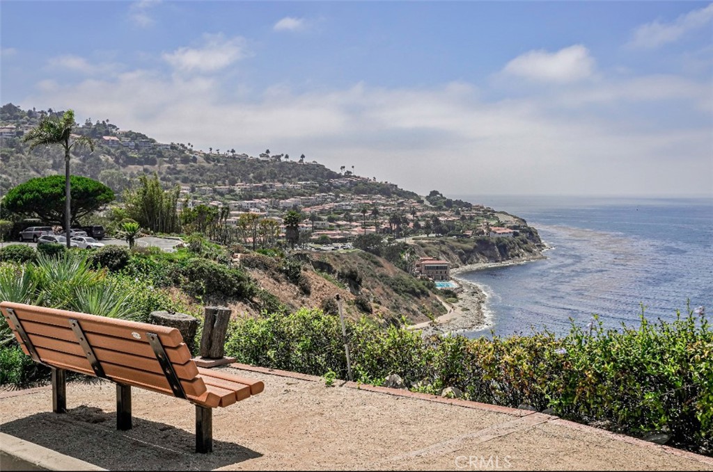 Location! Location! Location! Experience oceanfront living at Cote d'Azur Villas. This resort-style gated community sits on 8 beautifully landscaped acres, offering breathtaking views of the Pacific Ocean, panoramic Santa Monica Bay, the scenic "Queen's Necklace" view, and incredible sunsets year-round. This community features a private path to the beach, indoor/outdoor barbecue areas, and a heated pool.
Flooded with natural light, this top floor remodeled Condo with open floor plan, large windows along the south wall and glass slide doors to a spacious balcony allow views of the tree and ocean from every room, creating a seamless indoor-outdoor lifestyle. Living room opens to light-filled dining area and kitchen; open kitchen with high-end stainless steel appliances, and south facing ensuring cool summers and warmth in winter. The condo has two parking space in the garage with storage.
This vibrant community is centrally located within walking distance of Malaga Cove Plaza and Riviera Village, a charming destination filled with shops, restaurants, café and entertainment.