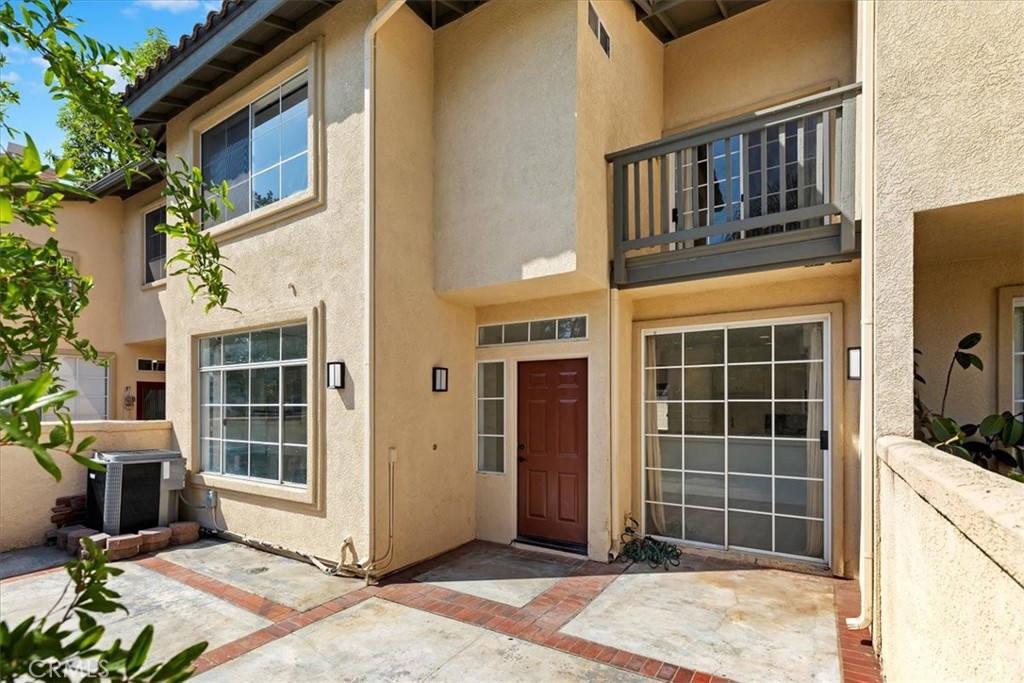 Embrace elevated OC living for an exceptional value at 27 Tierra Plano, a beautifully refreshed townhome nestled in the peaceful Tierra Montanosa enclave. This unique floorplan is the most sought-after in the community, giving you the feel of a detached home with no one above or below. Enjoy your own private yard, perfect for relaxing or entertaining. The home features two spacious bedrooms, each with its own private en-suite bathroom, plus a handy powder room and laundry downstairs. The entire home feels brand new, with fresh paint and modern fixtures throughout. A private, attached two-car garage and plenty of guest parking make life easy for you and your visitors. Step outside your door and enjoy the Tierra Montanosa community amenities, which include a pool, spa, and sport courts. Plus, as a SAMLARC member, you'll have access to the full suite of Rancho Santa Margarita perks, including the Lago Santa Margarita and its popular beach club, multiple pools, and an extensive network of parks and trails. This prime location offers incredible convenience with the 241 just a minute away to get anywhere in OC.