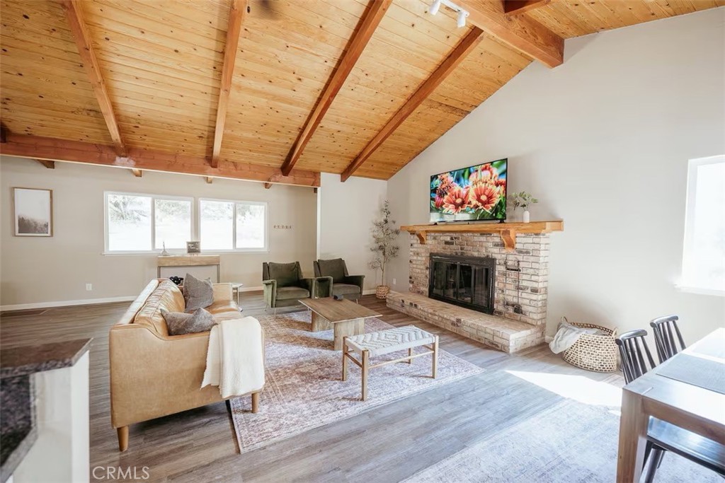 Welcome to this beautifully updated mid-century cabin nestled on a full acre in the scenic foothills of the Sierras. Surrounded by towering oaks and pines, this serene property offers the perfect blend of modern comfort and mountain charm—just 19 miles from Yosemite’s South Entrance, 4 miles from Bass Lake, and minutes to downtown Oakhurst.
This thoughtfully designed 3-bedroom, 2-bath home is being offered fully furnished and is already a successful short-term rental, with features that vacationers love and owners appreciate. The spacious layout boasts vaulted ceilings, designer interiors, and three king-size memory foam beds, plus a pull-out sofa and open-concept great room ideal for entertaining.
Highlights include:
• 3 spacious bedrooms with all king beds
• Primary suite with ensuite bath, work desk, and deck access
• Stylish, fully stocked kitchen with complimentary coffee station
• Indoor shuffleboard, 65” smart TV, and garage rec room with pool table, arcade, and cornhole
• Expansive deck with BBQ, dining space, and brand-new 7-person hot tub
• Picnic area and swing under a mature oak
• Central HVAC plus mini split for zoned comfort
• Professionally maintained hot tub (usable year-round)
• Dog-friendly setup with fully usable outdoor space
Whether you’re looking for a high-performing vacation rental, a weekend getaway, or a peaceful full-time residence, Sierra Oak delivers comfort, privacy, and proximity to everything the Sierra foothills have to offer.
Turnkey and income-ready—your mountain escape awaits.