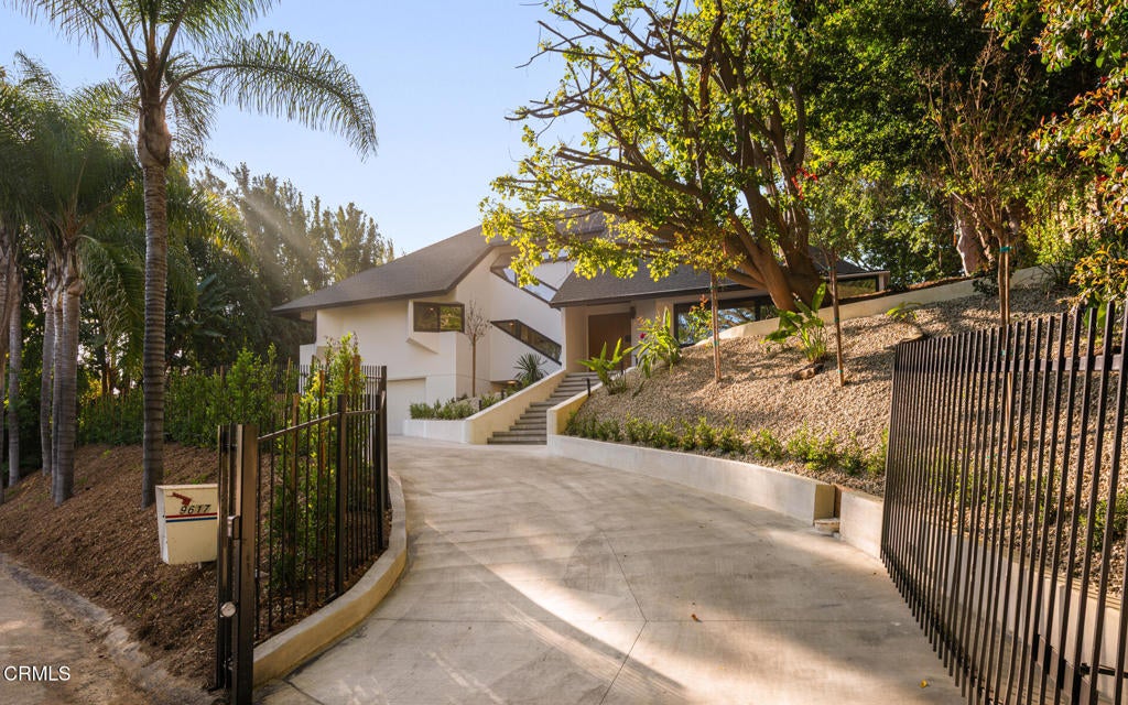 Photo of 9617 Oak Pass Road, Beverly Hills, CA 90210 (MLS # P1-27839)