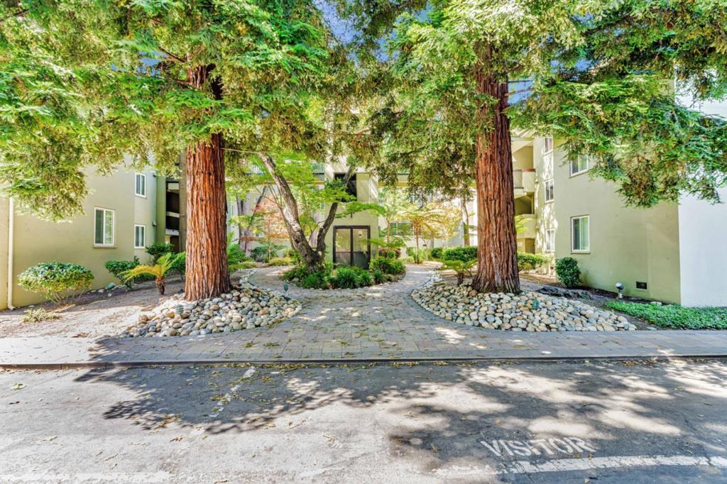 Charming mid-century top-floor condo blending classic appeal with modern updates! Located just steps from vibrant Downtown San Mateo, Central Park, and Caltrain, this light-filled home features an open floor plan, soaring ceilings, hardwood floors, and serene views of beautifully landscaped courtyards. Enjoy a freshly painted interior, peaceful surroundings, and access to a secluded pool, spa, and BBQ area. HOA dues include heat, water, garbage, building insurance, common area upkeep, and professional management. A rare opportunity in a prime location near Burlingame and key commute routes! Don't Miss this one!