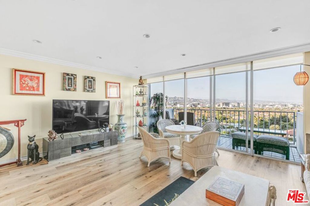 Unobstructed 180 Views. For the first time in 23 years, this stunning condo is on the market, featuring one of the most coveted view lines in Century City. Enjoy sweeping, unobstructed vistas of Beverly Hills, Sunset Plaza, Griffith Observatory, the Hollywood Sign, and Downtown Los Angeles. This gorgeous remodel offers an open floor plan, hardwood floors, a breakfast bar, and a spacious balcony for entertaining and Resort-Style Living. The building offers a rare private dog park (with fun dog park parties), a beautiful 6-lane pool with a stunning sun deck, and a state-of-the-art fitness center with over $100,000 in equipment overlooking the pool. Full-service amenities make every day feel like a getaway. Located in a fabulous community, just a few short blocks to Westfield Century City Mall, dining, and entertainment. A rare opportunity to own a view and lifestyle that almost never comes available.
