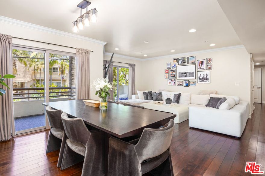 Front-facing, single-level condo located in the heart of Brentwood! Bathed in natural light, this stunning unit features 3 bedrooms, 2.5 baths and 2 parking spaces. Enjoy 5 private outdoor balconies, with every bedroom featuring its own front-facing balcony and serene tree-top views. Situated in a highly sought-after 12-unit building with elevator access, this beautiful home boasts hardwood floors, central AC/heat, a cozy fireplace, an in-unit washer/dryer, and guest powder room. The expansive open-concept gourmet kitchen is perfect for entertaining, complete with a breakfast bar, stainless steel appliances, and a Viking 6-burner stovetop. The spacious primary suite includes a walk-in closet, dual sinks, shower, and a separate soaking tub. Two additional bedrooms share a large bathroom with dual sinks. Secure, gated garage with two parking spaces and storage. Just a short stroll to cafes, markets, boutiques, and top dining spots on San Vicente and Wilshire Boulevards. A rare opportunity to live in one of Brentwood's most desirable locations!