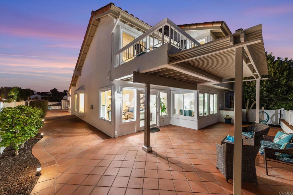 Another Revitalized Absolutely Beautiful Home with a Large Courtyard, Double car garage and Streaming Sunlight. Bellagio Model | 2 Primary Suites | 2.5 Baths | Loft | Expansive Courtyard Entry | Ocean-View Deck. Welcome to your private refuge in the heart of Ocean Hills Country Club—a haven for active adults! This elite retreat has been beautifully revitalized, blending modern comfort with timeless coastal charm. From the moment you arrive, you’re greeted by a spacious tiled courtyard with a white vinyl fence, outdoor lighting, and a rose garden—all set on a generous 50’ x 105’ lot. Main Level Features: Bright living room with gas fireplace, Formal dining area & breakfast room, updated kitchen with sleek white shaker cabinets, quartz counters, and stainless-steel appliances (including new counter-depth fridge & slide-in gas range) Convenient laundry room, Guest ½ bath, First floor primary suite with private dual sink vanity and bath. Upstairs Retreat includes: Second primary suite with walk-in closet, dual sinks, and a luxurious spa-style shower, Spacious Loft—ideal for a home office, library, or lounge and Access to an Ocean & Mountain-View Deck. Natural light pours through abundant windows, creating a serene and uplifting ambiance. Whether relaxing in the courtyard, enjoying morning sun on the patio, or soaking in colorful sunsets from the living room, loft, or bedrooms—you’ll always feel at home. Community Lifestyle: Located in the vibrant 55+ Ocean Hills Country Club, offers A Greek inspired lush community where the community landscaping, homes exterior walls and residents’ front yards are HOA maintained. You just enjoy your well-earned relaxation!! Recreation includes: 18-hole executive golf course (no green fees), Jr. Olympic heated saltwater pool & large spa, Fitness center, 40+ clubs & social events (arts, crafts, cards, billiards, sailing, RV club & more) All for incredibly low yearly club dues of just $10–$15! Secure RV parking. Live the coastal lifestyle without lifting a finger—this home is more than move-in ready; it’s an elevated way of life. Ocean Hills is Disneyland for adults… come experience it for yourself! Don’t miss your chance to own a fully updated, move-in ready home in one of North County’s most sought-after communities.