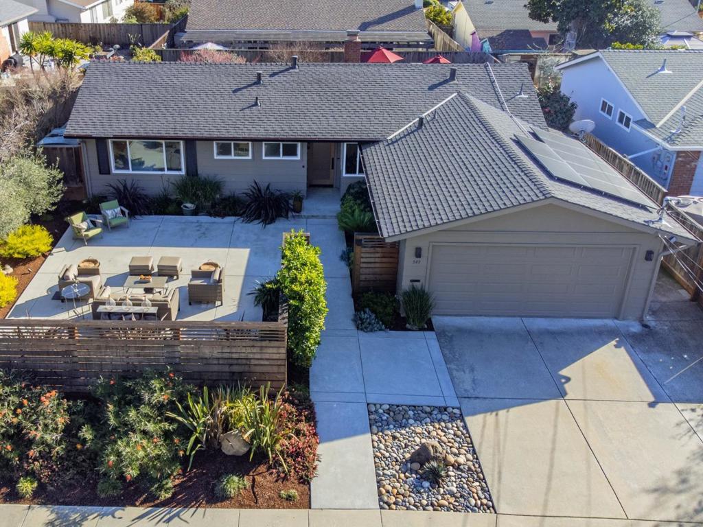 Gorgeous single level home in the Santa Cruz Gardens neighborhood! You will fall in love with this stunning indoor/outdoor living floorplan! Perfect for entertaining or enjoy all to yourself. Everyday is a vacation living in this fully updated home close to the community pool, school, park, hiking and biking trails. Lovingly cared for, for thirty plus years, and now available for a lucky family to move right in. Home features solid hardwood oak flooring, recessed lighting, owned solar system, fireplace with gas logs, 8-foot ceilings, solid core doors throughout, double pane Milgard windows with an extra wide custom slider that welcomes you into your backyard oasis of full sun and relaxation! The beautiful kitchen includes custom Quartzite natural stone countertops, GE Profile stainless steel fridge and dishwasher, JennAir gas range with built-in downdraft, and solid wood cabinets and crown molding. A private front and backyard features a hot-tub, large deck, artificial grass and lush landscaping on a low maintenance automatic drip system. This beauty is in mint condition!
