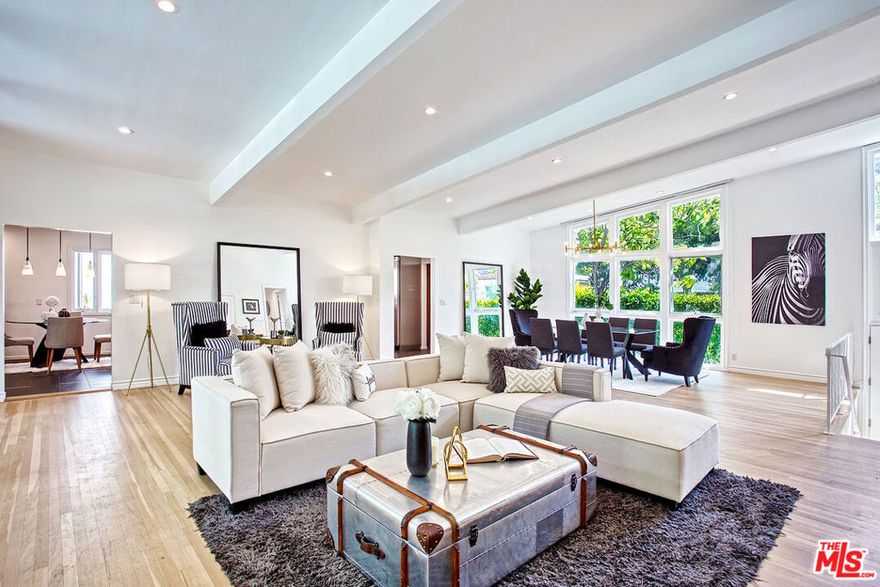 FURNISHED OR UNFURNISHED - Unique Single-Story Contemporary luxury living home. 4 Bedroom, 3 baths plus an office in the most desirable location. Live amongst celebrities just minutes from the gated Beverly Park Estates & near the iconic Beverly Hills Hotel. Renovated w/ the finest materials. Welcome entry, magnificent high ceiling w/ barn beams, exquisite open dining & family room lead to walls of glass that open up to a covered patio, very spacious & private flat paradise backyard w/ dazzling heated pool, built-in wood burning barbecue & pizza oven. Perfect indoor/outdoor living & great for entertaining. Stunning new chef's kitchen w/ Viking stainless-steel appliances & top-of-the-line imported Italian cabinets. Laundry room w/ sink & lots of cabinets. Grand master suite w/ two separate dual walk-in closets and private office. Master bath w/ jetted spa tub & separate large shower w/ double sink. Three additional bedrooms & baths. Warner Avenue Elementary school district! AVAILABLE FURNISHED OR UNFURNISHED for short or long-term lease.