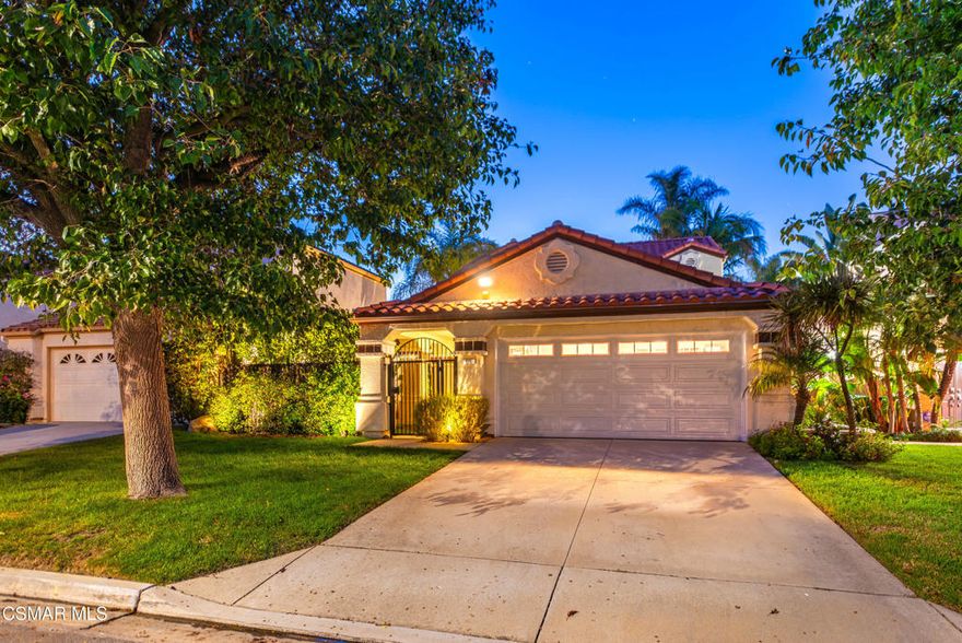 Discover an updated and elegant home in the exclusive Sycamore Hills at Wood Ranch community. Step through the front gate into a serene outdoor oasis that harmoniously blends the front and back yards. The main level features a spacious, sunlit kitchen flowing into the dining area and a living room with vaulted ceilings and a cozy fireplace, creating an inviting atmosphere. The attached two-car garage has been thoughtfully renovated with individual climate control, offering versatile space for a home office or creative studio.Upstairs, the expansive master suite is a private retreat, complete with vaulted ceilings, a custom-designed walk-in closet, and a slider to a balcony with views of the lush backyard. The master bath offers dual vanities and a separate tub and shower. Two additional guest rooms and a well-appointed guest bath with a custom vanity provide comfort and privacy for family and visitors.The nicely landscaped backyard is perfect for entertaining, featuring a grassy lawn and a patio beautifully illuminated by evening accent lighting. Living here means enjoying the community's resort-style pool and spa, along with easy access to hiking and biking trails in the Santa Monica Mountains, an 18-hole championship golf course, and multiple parks.