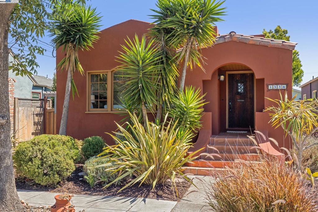 This Charming 1928 Spanish Mediterranean Bungalow in Alameda’s Coveted East End offers 1,711 square feet of beautifully preserved living space with 3BD/2BA, full of warmth, character, and thoughtful updates. From the arched entry and terracotta tile steps to the handcrafted front door and original fireplace, the home showcases timeless architectural detail. Inside, the spacious living room flows seamlessly into a formal dining room, while the bright, updated kitchen pairs with a large family room that opens directly to the sunny backyard—perfect for indoor-outdoor living. Both bathrooms have been recently remodeled, blending modern comfort with classic design. Additional highlights include a long driveway leading to a detached garage, beautifully landscaped gardens, and inviting outdoor spaces ideal for relaxing or entertaining. Situated in Alameda’s desirable East End, you’ll be close to top-rated schools, Lincoln Park’s open green spaces and community pool, as well as all the shops, restaurants, and historic movie theater on Park Street. With convenient access to BART, the SF Ferry, and I-880, this home is as practical as it is charming. A rare opportunity to own a piece of Alameda’s history in one of its most sought-after neighborhoods.