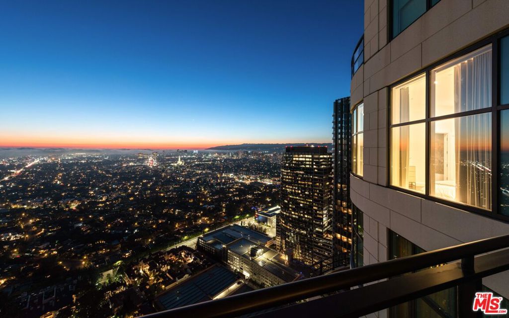 Experience the pinnacle of luxury living in Penthouse 40, an extraordinary residence crowning the entire 40th floor of The Century building. Renowned interior designers have meticulously crafted a harmonious blend of timeless, contemporary sophistication throughout this sprawling 9,290-square-foot haven. The spacious great room with soaring 10-foot ceilings, seamlessly transitions into a formal dining room, a game room/library with a cozy fireplace, and a lavish screening room adorned with floor-to-ceiling glass, offering unparalleled vistas of Century City and beyond. With four expansive terraces totaling 1,900 square feet, immerse yourself in the breathtaking 360-degree views, where every moment unveils a new spectaclefrom the downtown skyline to the Pacific Ocean. The open chef's kitchen is equipped with top-of-the-line appliances including a paneled Sub-Zero refrigerator, Wolf double ovens, Miele stainless steel cooktop, and Sub-Zero full-height wine storage and connects with the family room and dining room, along with multiple al fresco terraces. The primary suite is a sanctuary of serenity, boasting panoramic windows framing sweeping views of Los Angeles. This extraordinary space features a cozy seating area with a fireplace, dual baths adorned with high honed Calacatta Sponda marble, custom-designed painted vanities with polished chrome Waterworks faucets, and a luxurious 72" Whirlpool soaking tub. Other notable amenities include an office with views of the skyline, private terrace hot-tub and exclusive dual elevator entry.The Century building itself, a masterpiece by renowned architect Robert A.M. Stern, stands as a beacon of elegance amidst nearly four private acres of lush gardens. Offering LEED Silver certification by the US Green Building Council, The Century provides a sustainable and sophisticated environment for its residents, who enjoy unrivaled amenities and services. Situated in the heart of Los Angeles, The Century affords its residents the epitome of West Coast elegance and international influence, with convenient access to Century City shopping, dining, and theaters, and just minutes away from the glamour of Beverly Hills. Experience the ultimate in luxury living at Penthouse 40a residence that transcends the ordinary and redefines the art of sophisticated urban living.