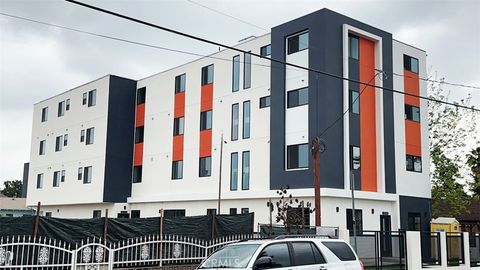 Photo of 1596 W 36th Street, Los Angeles, CA 90018 (MLS # OC26040555)