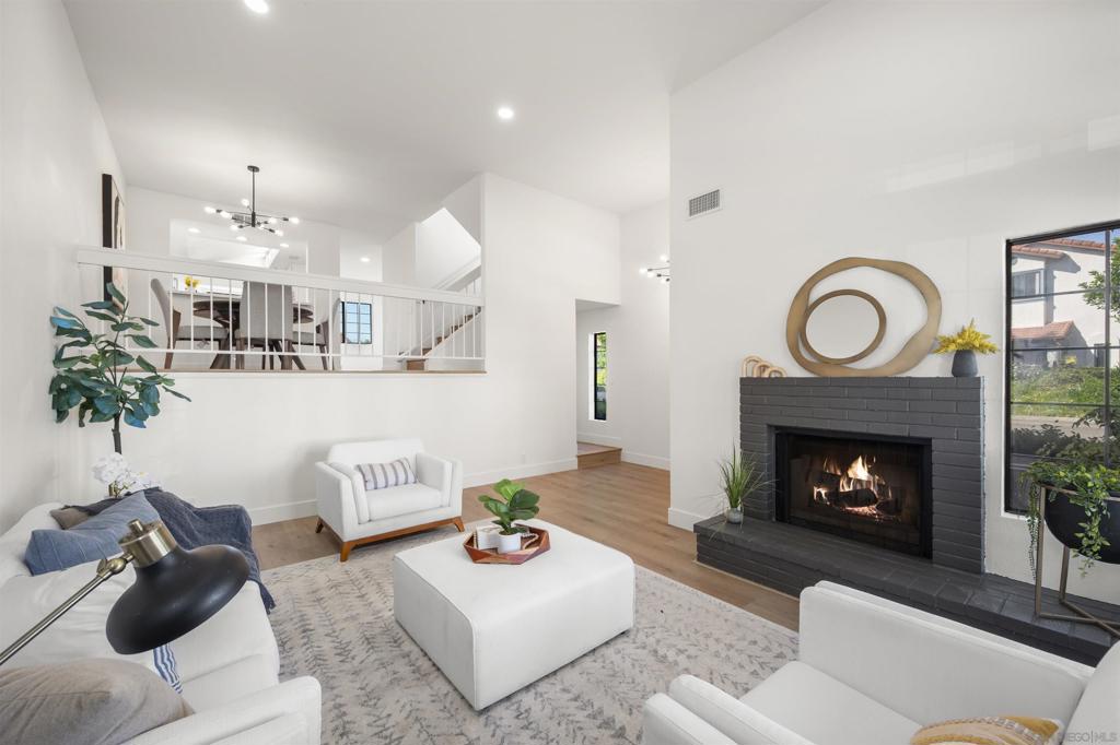 Come see this beautiful bright remodeled tri-level end unit in the heart of San Diego! This attached SFR is VA Approved and priced the same as the last model match sale in the community.  This turnkey property features stunning upgrades throughout, including brand-new shaker cabinets in the kitchen and bathrooms, sleek quartz countertops, and durable vinyl plank flooring that adds both style and function. Fresh interior paint, updated lighting, and modern fixtures create a bright and inviting atmosphere. Possibility to add optional 3rd bedroom.  Located in a desirable neighborhood, this move-in ready gem offers both comfort and convenience.  Conveniently located just off the 8 Freeway with access to Mission Valley shopping, Mission Trails, close to SDSU and everything else central San Diego has to offer.