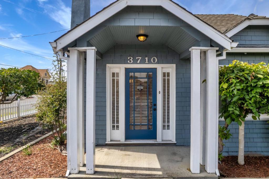 Welcome to 3710 Smith Street, a thoughtfully updated 4-bedroom, 2-bathroom home situated on a spacious corner lot in the heart of Union City. Offering 1,698 sq ft of living space on a 4,700 sq ft lot, this home features modern finishes throughout. The light-filled living room includes a wood-burning fireplace with a marble mantle and oversized windows. The kitchen is designed for both style and function, with quartz countertops, stainless steel appliances, an island, and plenty of cabinet storage. The primary suite offers a walk-in closet and an en-suite bath with double sinks and sleek finishes. Additional highlights include recessed lighting, laminate wood flooring, and fresh interior paint in designer tones. Equipped with central air conditioning & heating, this property ensures comfort year-round. Outside, the fully fenced yard provides privacy and space for relaxing or entertaining, along with a storage shed for convenience. Located just half a mile from Union Landing with easy access to I-880, I-680, and U.S. 101, this move-in-ready home combines comfort, location, and value.