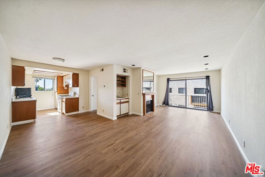 Located near Sunset Boulevard in the Hollywood area, this approximately 1 bedroom residence includes one bathroom and offers a bright, functional layout designed for comfortable daily living. The unit features access to a private balcony, providing an outdoor extension of the living space. Assigned garage parking and an on-site laundry room are included for convenience. The surrounding neighborhood offers proximity to nearby shopping, dining, entertainment, and outdoor recreation areas, including access to local trails and city amenities. Tenant pays gas and electricity; owner pays hot and cold water. Pets permitted. All features, measurements, and availability are approximate; tenant to independently verify all information.