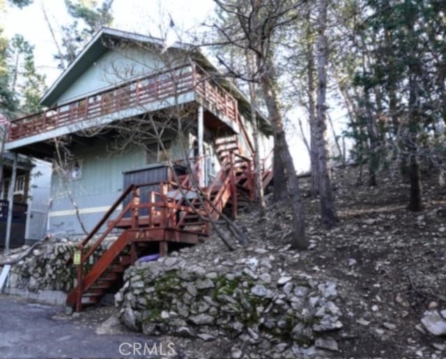 Charming Cabin Retreat in Lake Arrowhead! Escape to tranquility with this delightful single-family cabin nestled in a serene outskirt of Lake Arrowhead in the Crest Park area.
Key Features:
- Bedrooms: 2 spacious bedrooms designed for comfort and relaxation.
- A large studio space complete with its own bathroom, perfect for guests or as a creative workspace.
This cabin is perfect for those seeking a peaceful getaway or a year-round residence in the beauty of Lake Arrowhead.