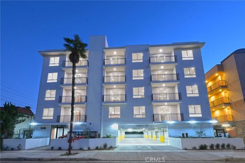 Photo of 14606 Sylvan Street #206, Van Nuys, CA 91411 (MLS # SW26055408)