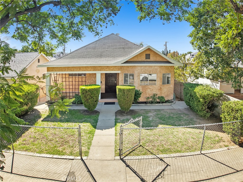 The Charming and classic beautiful home, is nestled in the heart of Highland Park, ready to move in. Close to all amenities and restaurants on York Blvd and in the beautiful Highland Park between Eagle Rock, Pasadena, Glendale and the City of Downtown L.A. including Dodgers Stadium. This home offers 3 bedrooms, and 2 bathrooms, one of the bathrooms was just remodeled with new tile walls. A combined huge living room and dining rom, and a spacious kitchen, with the space for those warm family occasions, the inside of the house was just painted and had a new laminated floor installed, also a new 200 amp electrical box. The old deck was just replaced with a new one, offering a nice view to the back yard, a space basement, and next to the basement is a separate nice complete art studio waiting to be used, with a completely fence huge back yard that offers entrance through the ally, and has parking space for cars and RV's. Do not let this opportunity pass you by, a house that is ready to move in and its zone LARD2 its perfect for building up another house and make extra rental income. Property to be sold as is in it's present condition.