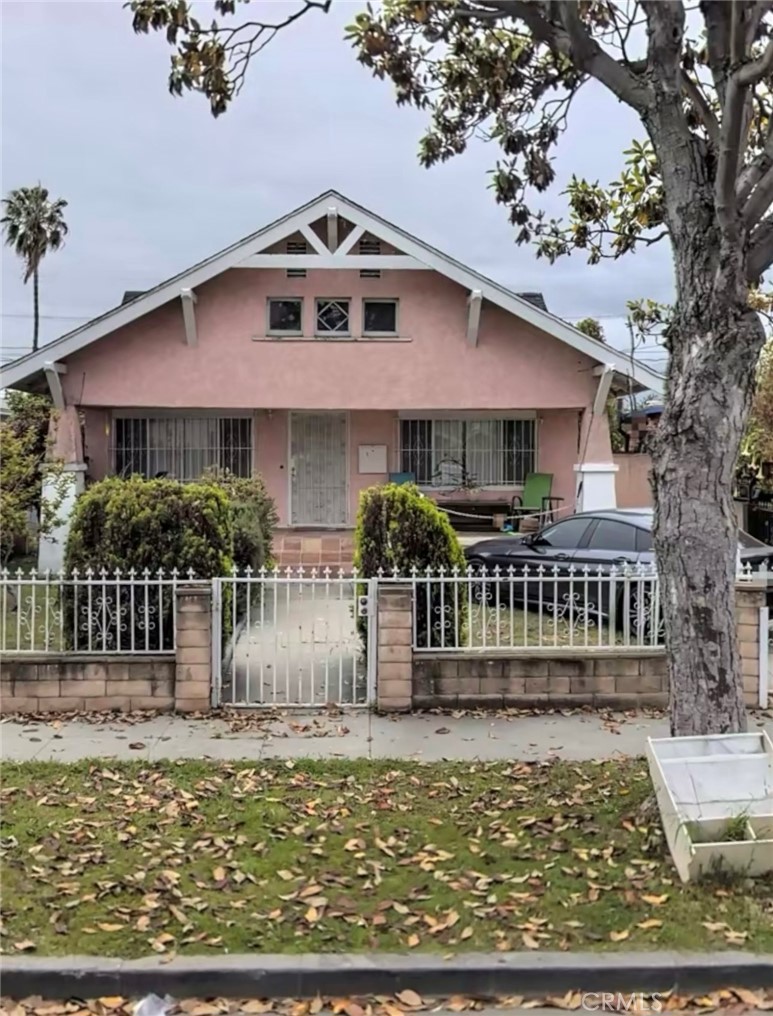 Charming duplex located in the heart of Vermont Square in Los Angeles. The front unit features 3 spacious bedrooms and 1 bathroom, offering a comfortable layout ideal for families. The second unit sits above the detached 2-car garage and includes 2 bedrooms and 1 bathroom—perfect for rental income or extended family living. Conveniently situated near schools, parks, and public transportation, this property blends functionality with investment potential.