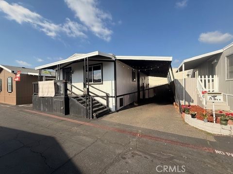 Photo of 716 N Grand Ave #A7, Covina, CA 91724 (MLS # DW26020210)