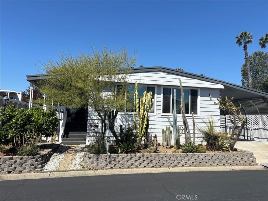 **NEWLY REMODELED**Welcome home to 1145 E Barham #100, San Marcos in the coveted community of San Marcos Mobile Estates for Seniors 55+ (and 2nd resident can be 40+) **RENT CONTROLLED - LEASED LAND PARK**CERTIFIED ROOF**TERMITE CLEARANCE**This home is largest on the market and offers SPACIOUS OVERSIZED ROOMS THROUGHOUT ~ You'll have all the space you need with this open concept floorplan! Living room 19X22 - Kitchen with dining room 30X11 - Primary Bed 22X12 - 2nd Bedroom 19X10 ~ It lives like Dual Primary Suites with both having ample space and ensuite bathrooms. The long carport accommodates 2-3 vehicles and features an AMAZINGLY LARGE WORKSHOP / TOOL SHED ~ or it can be used as storage too! This beautifully well-kept home has FRESH interior paint, NEW LVP flooring and NEWLY REMODELED PRIMARY BATH, NEWER HVAC, NEWER windows with custom blinds & window coverings, skylights, ceiling fans, indoor laundry room with sink, DUAL primary closets, DUAL sink vanities, soaking tub and shower, TANKLESS water heater. 

Community boasts many amenities in an active senior park ... sparkling pool and jacuzzi heated year-round + offers swim aerobics classes 3x week, billiards, library, shuffleboard & a dog park! Conveniently located just off the 78FWY and close to shopping, dining, public transportation and both Palomar and Kaiser hospitals & medical offices.

*NO HOA**NO PROPERTY TAXES ~ ONLY $400/YR REGISTRATION**RENT CONTROLLED space rent of approx $650/mo. Gas/electric, water and sewer are metered and added to your space rent.