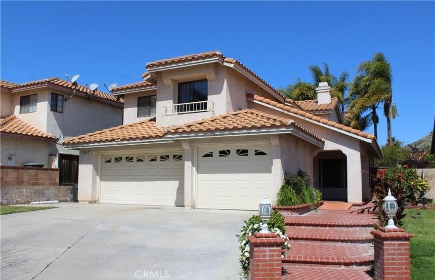By appt only:  Corona Hills single family 4 bedroom home with nice curb appeal & sitting at the end of a cul-de-sac!  Home features brand new carpet & laminate wood flooring throughout! Formal living & dining rooms w/high ceilings & double sided brick fireplace, spacious kitchen w/breakfast nook, upgraded oven & microwave, and lots of cabinet & counter space.  Family room shares the brick fireplace & has sliders to back yard & covered patio area.  Downstairs includes downstairs laundry, a half bathroom, and access to your 3 car garage!  All 4 bedrooms are upstairs including a large master suite with a private balcony.