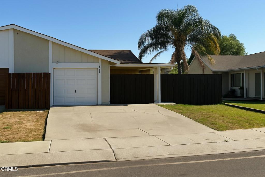Single-story attached home with no HOA fees, A possible opportunity for a first-time buyer. Featuring 3 bedrooms and 2 bathrooms, this home offers a comfortable layout with a bright living room and a kitchen complete with an eat-in area. The kitchen is equipped with a newer stainless steel stove and built-in microwave, plus a sliding glass door that opens to the side yard and backyard for seamless indoor-outdoor living. Home is currently being cleaned, painted and prepped before listing date. NO SHOWINGS before Mon. 9/22/25