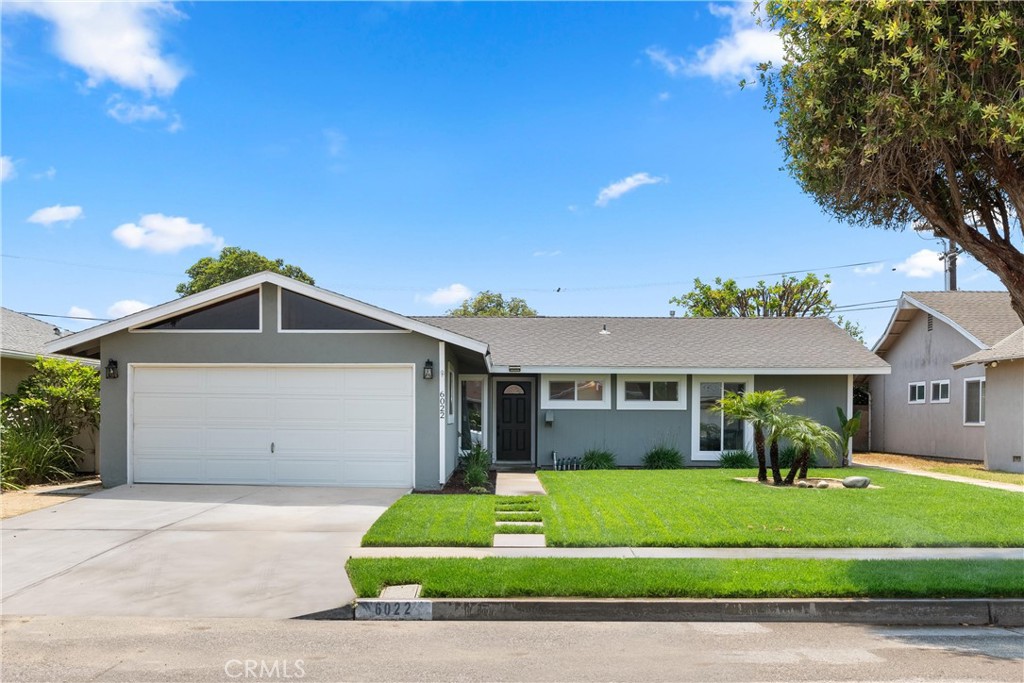 Welcome to this beautifully updated single-story home located in one of the most convenient and desirable pockets of Huntington Beach. As you arrive, you're immediately impressed by the freshly landscaped and manicured front yard, with 18x18 stepping stone pathway. A newly installed front door welcomes you inside, where you'll be greeted by wide-plank luxury vinyl flooring in a warm tones, fresh interior paint, and a spacious open floorplan bathed in natural light. The living and dining areas flow effortlessly into the heart of the home—a remodeled kitchen designed for both everyday living and entertaining. Enjoy a custom sit-up breakfast counter, sleek quartz countertops, all stainless steel appliances and a bay window that brings in even more sunlight. The cabinetry has been freshly painted and updated with new hardware, soft-close drawers, and a Lazy Susan to maximize storage. Custom pendant lighting adds style, while a deep stainless steel sink and microwave/hood combo complete this impressive space. Beyond the living room is a large and inviting family room centered around one of two cozy fireplaces. A sliding glass door that opens to the private, low-maintenance backyard, a space offering indoor-outdoor living at its best. Whether relaxing under the café lights, enjoying the block wall-enclosed yard, or staying cool inside with the high-performing central HVAC system, comfort is felt throughout all 1,681 square feet of living space. The home features 3 bedrooms, each with dual mirrored closet doors. Bedroom three offers French doors with direct access to the backyard—perfect for guests, a home office, or additional living flexibility. The primary suite is a true retreat, offering a fully renovated ensuite bathroom with a tile and glass walk-in shower, low-flow toilet, updated lighting, and a Bluetooth speaker fan with color-changing mood settings. The hall bathroom has also been tastefully updated with tile flooring, a glass-enclosed tub and shower combo, and modern lighting. Additional touches like new baseboards, all new dual-pane vinyl windows, recessed LED lighting throughout, a new raised-panel door package, and direct access to the oversized two-car garage reflect the upgrades that define this home. Located within walking distance to Helen Stacey Middle School, Clegg-Stacey Park, and just minutes to the 405 Freeway, shopping, dining, and a quick drive to the surf, sand, and sun of SoCal's best beaches—this is the one you’ve been waiting for.