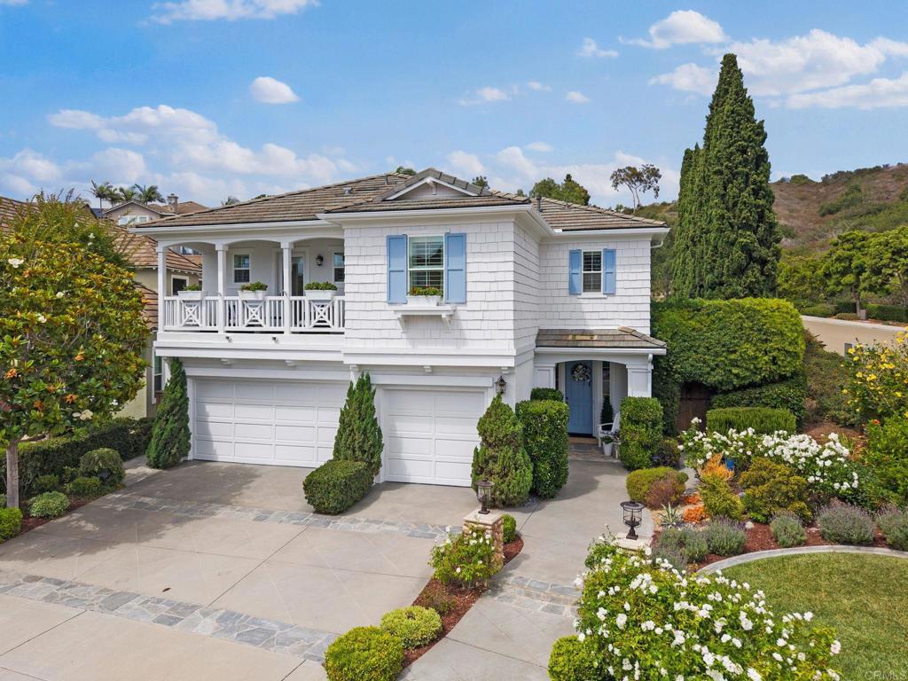 Coastal Living Meets Thoughtful Luxury in Carlsbad. Experience the perfect blend of elegance, comfort, and functionality in this stunning Carlsbad residence. The heart of the home is a beautifully designed gourmet kitchen, ideal for the inspired home chef, featuring top-tier finishes and seamless flow for entertaining. A full downstairs bedroom with a private en-suite bath offers ideal accommodations for guests or multigenerational living. Upstairs, enjoy the expansive open loft with a dedicated study nook—perfect for work, play, or relaxation. The spacious primary suite is a private retreat, complete with a generous sitting area, 2 large walk-in closets, and a private balcony where you can enjoy peaceful morning coffee or evening sunsets. Two additional upstairs bedrooms also enjoy access to their own shared front balcony, capturing refreshing ocean breezes year-round. Step outside to a beautifully landscaped backyard featuring a cozy outdoor fireplace, perfect for gatherings on cool coastal evenings. Located on a quiet cul-de-sac, directly across the street is a playground and open green space. This home combines style and coastal charm in one of Carlsbad’s most desirable communities—don’t miss your opportunity to call it yours.