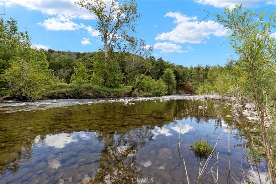 2 rare creek front lots on Centerville road totaling 12.64 acres. 1st lot is 6.57 acres and mostly level with  creek front, a Tennis court, building site, and seasonal ponds and gated access (shared driveway with 12352 Centerville road). The Second is 6.07 acres with creek front and several nice potential building sites. Centerville road crosses through this parcel and an orchard/ag field has been developed on the upper side. Butte Creek is a year-round creek famous for its Chinook Salmon run. Both lots have stunning views of the creek, canyon, ponds and Castle rock. Many beautiful rock quarry piles left over from the Gold Rush days. Come enjoy the wilds and some gold panning in your own back yard. Only 14 minutes to the bustling college town of Chico Ca--Offering award winning schools, hospital, shopping and year-round farmers markets, golf, and Bidwell Park. No Power, No wells. Power crosses property so a power drop should be fairly easy.