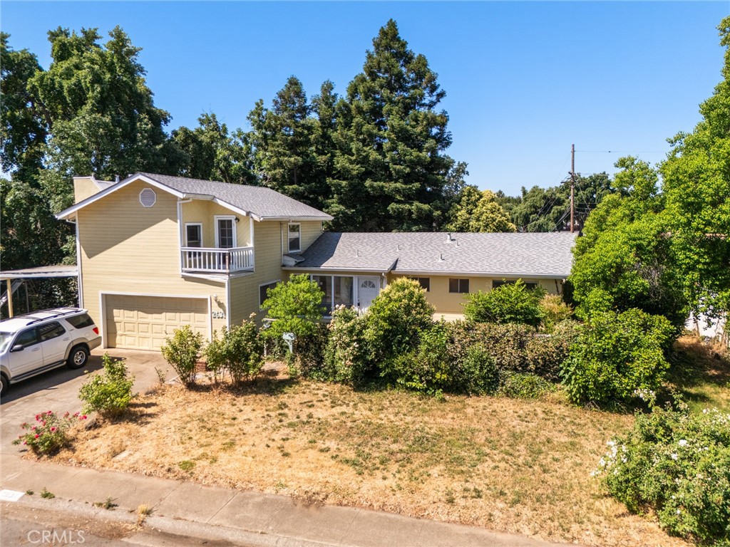 Great location !! It's close to everything - shopping, schools, restaurants!!! The only 2 story on the street, a lot of house for not a lot of money !! Refrigerator is included and stainless-steel appliances! Fireplace with insert, some newer flooring in family room. Large lot !