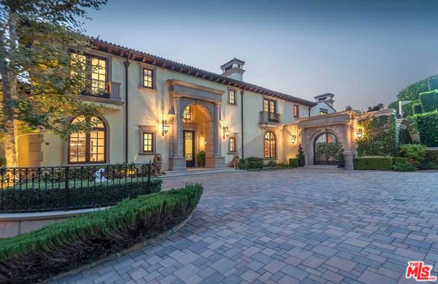 Gated, private Italian Villa in prime Beverly Hills. Seldom does a home of this caliber grace our market. Situated on over one acre of flat land with city views this approximately 16,000 square foot home must be seen to be fully appreciated. Grand scale public rooms lead to a fantastic grassy yard with outdoor living areas, and infinity edge pool. Features includeÃ‚Â·         Six en suite bedroomsÃ‚Â·         Eleven custom bathroomsÃ‚Â·         Gourmet kitchenÃ‚Â·         Wine cellar, Home theatre and much more.