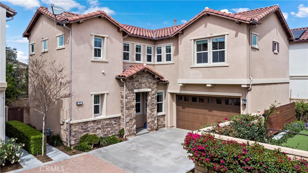 The Crossing at Baker Ranch, crafted by Toll Brothers, epitomizes refined living with unparalleled quality and a resort-style ambiance. Nestled on one of the most coveted lots within The Crossing, this stunning single-family residence boasts a generous 3,380 square foot lot and offers an elegant fusion of sophistication and functionality.
The thoughtfully designed floor plan includes a convenient downstairs bedroom and bathroom, while an expansive loft upstairs provides additional living space. Stunning chandeliers illuminate the living room and all bedrooms, enhancing the home’s refined ambiance.
The gourmet kitchen is a chef’s dream, featuring a spacious island with oversized granite countertops, premium stainless steel appliances, a built-in range and oven with a high-quality exhaust hood. Designed for both beauty and low maintenance, the backyard showcases high-quality brick flooring, while luxury waterproof vinyl flooring graces the living room, and elegant carpet flooring extends throughout the upstairs and additional rooms.
The expansive master suite is a private retreat, boasting large windows that invite natural light, a massive walk-in closet, and a spa-like ensuite bathroom with dual sinks, a soaking tub, and a walk-in shower.
Baker Ranch offers an exceptional lifestyle with resort-style amenities, including three clubhouses and swimming pools, relaxing spas, eight parks with sports courts, world-class hiking and biking trails, a tennis park, beach volleyball, basketball courts, and a dedicated dog park. Conveniently located near the Irvine Spectrum and a variety of shopping and dining destinations, this home also provides easy access to the 5, 241, and 133 freeways. With a low HOA fee and no Mello-Roos, this property is a rare opportunity to experience luxury living at its finest.