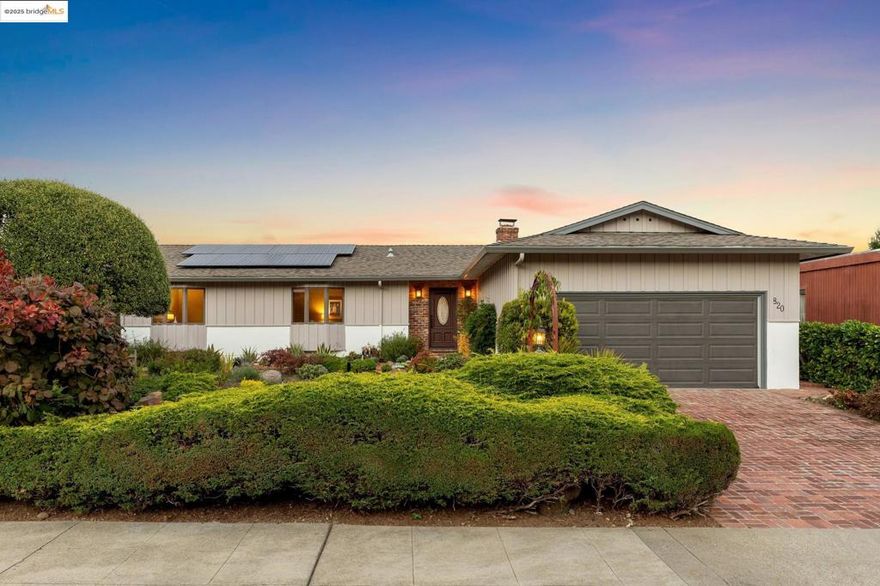 One-level living with magnificent canyon views, this El Cerrito mid-century is beautifully appointed and move-in ready. With substantial improvements including beautiful updates to the kitchen, solar panels + Tesla power wall, and drought-resistant landscaping, this home has been curated for today’s buyer. 820 Kensington features soaring wood-and-beam ceilings with a wrap-around brick fireplace, all original mid-century features. With expansive windows offering views of the verdant oak forests and eye-level with gliding raptors, the outdoors are brought in. Three spacious bedrooms - one of which is an updated en-suite - have garden views, the kitchen is newly updated with new stainless steel appliances and stunning green granite countertops, and an attached two-car garage makes living easy. A peaceful garden path leads to a bonus studio, the perfect work-from-home office…no need for a zoom background with Wildcat Canyon at your back! A quick drive down Moeser or along Arlington leads to local coffee shops, grocery stores, and BART.