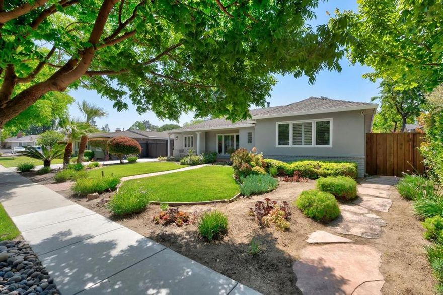 Experience the perfect blend of luxury and comfort in this beautifully renovated resort-style home, nestled in one of Willow Glens most sought-after neighborhoods. The total square footage is 2,923 including the 764 sf ADU. Just moments from top-rated schools and vibrant downtown Willow Glen, this exceptional one-story residence is both sophisticated and versatile.  The main home features an expansive culinary kitchen with custom cabinetry, slab granite counters, and top-of-the-line appliances. The primary suite boasts French doors leading to the serene back gardens and a spa-like primary bath includes a soaking tub, dual sinks, a walk-in shower, and a custom-built walk-in closet. Adding to the homes versatility, the spacious 1-bed, 1-bath ADU is perfect for guests, multi-generational living, or rental. Step outside to your private resort-style backyard, complete with a sparkling solar-heated pool and spa with a motorized safety cover, a terrace with pergola, and lush landscaping featuring fruit trees. Detail defines this home, with hardwood floors throughout, a 9.0+ KW solar system, Ring security cameras, smart switches and door locks, five skylights, and six French doors ensuring abundant natural light. Rare oportunity to own a standout property. Schedule a tour today!