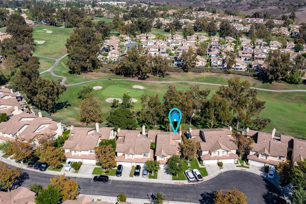 WELCOME TO THIS CHARMING TWO-STORY END UNIT NESTLED IN THE HIGHLY SOUGHT-AFTER TIERRA LINDA GOLF COURSE COMMUNITY. PERFECTLY POSITIONED JUST OFF THE GREEN AT HOLE #1. This residence is the largest model, offers stunning panoramic golf course views from multiple rooms which a serene backdrop for everyday living.
Step inside to a bright, open and inviting floor plan. The living room features large windows, vaulted ceilings and seamlessly flows into the dining area.
The family room offers a cozy fireplace that creates a warm focal point for gatherings and the spacious kitchen is designed for both everyday living and entertaining, complete with granite countertops, stainless steel appliances, breakfast bar seating, and direct access to the private patio—perfect for dining al fresco or relaxing by the fire pit.
Upstairs, the primary suite is a private retreat with vaulted ceilings, panoramic fairway views, and a spa-like ensuite bathroom. Two additional bedrooms offer versatility for family, guests, or a home office, while updated bathrooms showcase stylish fixtures and modern finishes.
Community amenities include a sparkling pool, spa, hiking/biking trails, and the historic Trabuco Rancho Adobe (1810) all just steps from your door. Enjoy resort-style amenities with full SAMLARC privileges to access the Lago Santa Margarita Beach Club and Lagoon. Ideally located near Tijeras Creek Golf Course, award-winning schools, scenic parks, dining, shopping, and major commuting routes.
Additional highlights include: The home has been re-piped with PEX, has upgraded windows throughout, recessed lighting, two-car garage and plenty of storage. The HOA is currently completing a new roof and fresh exterior paint across the community.
Don’t miss the chance to call this move-in ready, golf course view home yours!