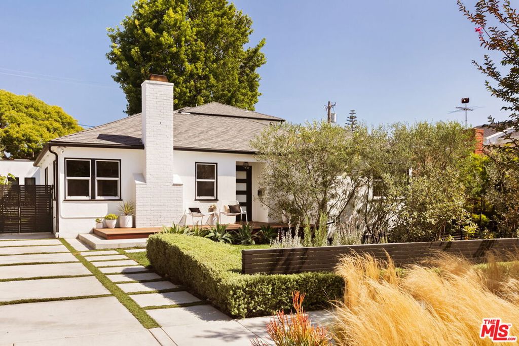 Experience a beautifully updated Mar Vista home on a stunning tree-lined street! This spacious 3 bed, 2 bath main house + stunning 1 bedroom ADU is perfect for enjoying indoor/outdoor living and hosting friends year round. Enter through the open-concept living room with soaring ceilings and bright skylights. A large dining area flows effortlessly into the contemporary kitchen featuring stainless steel appliances, shaker cabinetry, and a breakfast nook. Two bedrooms and one bath complete the first floor. Upstairs you'll find the primary suite complete with a relaxing soaking tub and private balcony. A welcoming den, excellent for large gatherings or cozy nights, opens up to a dreamy backyard shaded by mature landscaping. Step onto the Ipe Wood deck to dip into the hot tub, or grill your BBQ favorites! The ADU's Fleetwood doors fully pocket to create a seamless indoor/outdoor experience in the backyard, and its surround sound system, and drop down projector make for spectacular home movie nights. The rich minimalist design of the ADU allows for great flexibility! Use the space as an office + guest room, home theater, private in-law unit, or stylish income property. Local hotspots Bluey's, Alana's, Lucky Strike, Beethoven Market, Fatty Mart, and The Penmar are all just moments away. Stop by Everglade and prepare to fall in love. *(Some furnishings may be available to be left or purchased, owners are planning a long distance move).