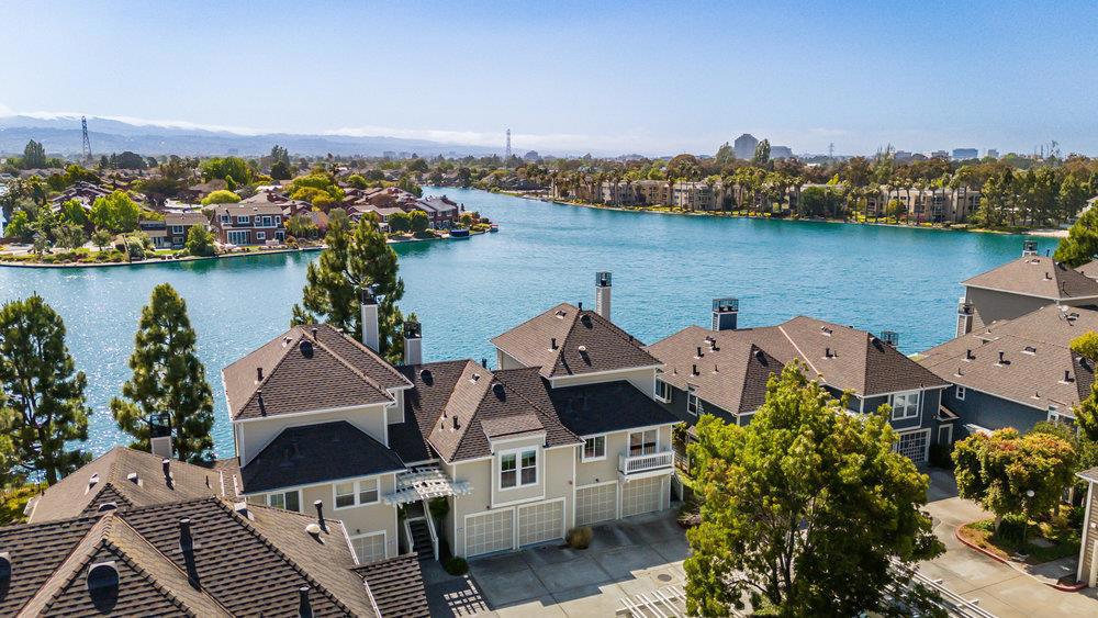 Tranquil Bayfront Living Rare 2-Bedroom Waterfront Townhouse with Stunning Widewater Views Direct waterfront location with views from nearly every room. Located in a highly desirable and private end building, this 2-level retreat seamlessly blends natural beauty, comfort, and style. Step into a light-filled open layout with vaulted ceilings and a spacious living and dining area that flows effortlessly to a waterview patio. The updated kitchen features quartz countertops, a gas stove, and a thoughtful layout for easy cooking and entertaining. - Vaulted Ceilings & Open Feel: Bright and airy with natural light throughout. - Beautiful Finishes: Bamboo flooring, tile in kitchen and baths, and plush carpet in bedrooms. Stainless Steel kitchen appliances. - Private Outdoor Spaces: Water-facing patio off the primary suite and additional patio off the main living area. - Attached 2-Car Garage: Includes in-unit laundry and ample storage. - Resort-Style Amenities: Waterfront pool, spa, community beach access, and well-maintained common areas. - Excellent Location: Close to Sea Cloud Park, the Bay Trail, top-rated schools, shopping, dining, and major employers. This is more than just a home, its a serene lifestyle surrounded by water & nature