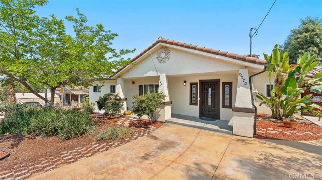 Come discover the perfect blend of space, style, and sustainability in this beautifully maintained Spanish-style single-story home, located in the desirable community of Spring Valley, California. Situated on a sprawling 22,000+ square foot lot, this property offers over 3,000 square feet of interior living space, thoughtfully designed for both comfort and function.
Step inside to find 6 spacious bedrooms—two with private entrances—3 full bathrooms and 1 half bath, and a versatile den with fireplace, ideal for a home office or additional living space. The home features tile flooring throughout, combining durability with timeless style. A generously sized kitchen with granite countertops, ample cabinetry, and included appliances serves as the heart of the home.
Enjoy modern conveniences like two separate A/C systems, two whole house fans, and a smart A/C controller for customized climate control. The home is also equipped with an indoor fire sprinkler system and a dedicated laundry room with sink for added functionality. This energy-efficient home is equipped with sustainable features, including:
Tesla Solar – Two systems with 31 panels, Two tankless water heaters, Energy-efficient windows, Rain Soft whole house water system, Drinking water filtration, Water softener & conditioner system
The fully fenced backyard is an entertainer’s dream! Featuring a deck, therapeutic jacuzzi, pergola with fire pit, and low-maintenance landscaping. For the eco-conscious gardener, enjoy 10 rain barrels, an enclosed garden box area, and a collection of mature fruit trees including Fuji apple, orange, fig, strawberry guava, pomegranate, lime, jackfruit, and grapevine.
This rare Spring Valley gem offers comfort, functionality, and long-term efficiency, making it an exceptional home!