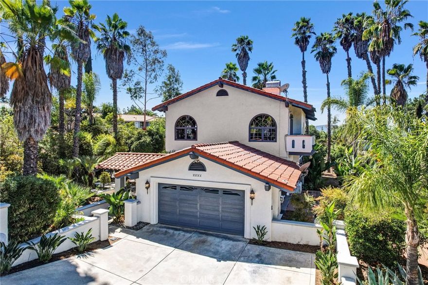 Welcome to this breathtaking two-story custom-built Spanish Mediterranean estate, proudly owned by one family and located in one of Escondido’s most desirable neighborhoods. From the moment you enter, soaring ceilings, a sweeping staircase, and dramatic arched windows capture your attention and set this home apart.

The spacious layout features 5 bedrooms, 3 bathrooms, office, den, and a huge game room, along with three balconies that extend the living space outdoors. The upgraded kitchen showcases quartzite countertops, premium appliances, and custom inset cabinetry, while the bathrooms have been tastefully remodeled with timeless finishes. Distinct architectural details, marble-look tile flooring, arched doorways, and a whole-house vacuum system add both character and convenience.

A private courtyard with a fountain and multiple patios provide inviting spaces for entertaining or relaxing. Ideally located just minutes from Kit Carson Park, The Vineyard Golf Course, local wineries, North County Mall, San Pasqual High School, and the San Diego Safari Park, this is a rare opportunity to own a grand one-owner estate that blends elegance, function, and location.