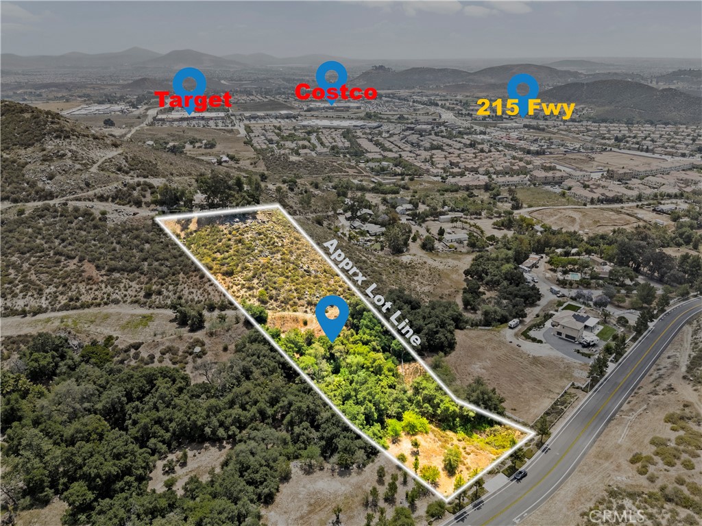 Discover an unparalleled opportunity to build your dream estate on this exceptional 3.22-acre parcel in highly sought-after Murrieta, California, offering the perfect canvas for a custom luxury residence with ample space for equestrian facilities, a private vineyard, or sprawling outdoor entertainment areas, all while benefiting from its prime Estate Residential (ER-1) zoning allowing for diverse residential possibilities. This expansive lot is strategically located for ultimate convenience, providing immediate access to the 215 Freeway, mere minutes from the brand new Costco and The Orchard Shopping Center, and positioned directly outside the prestigious, guard-gated Greer Ranch Community, ensuring you benefit from esteemed surroundings and community amenities while enjoying the tranquility and panoramic views of your own significant acreage—an opportunity to create a lasting legacy in one of Murrieta's most desirable land offerings.