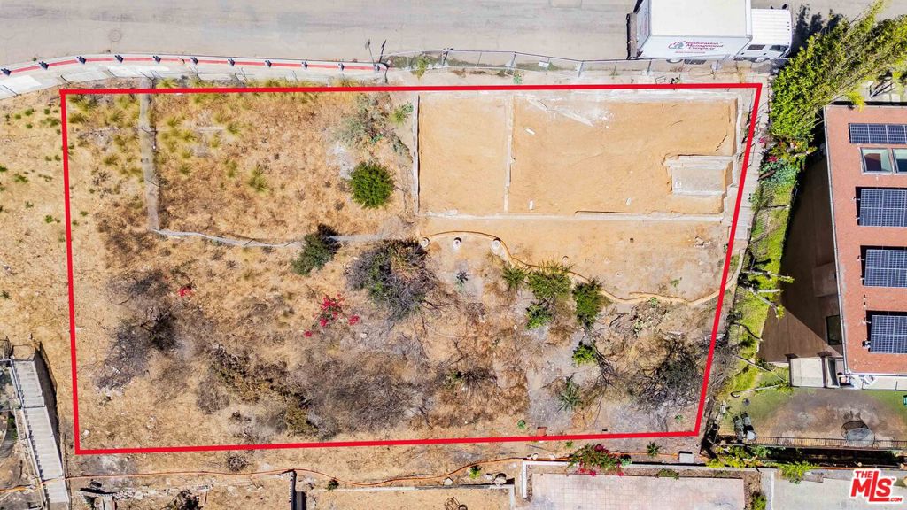 An extraordinary opportunity to own a stunning ocean-view double lot in the highly sought-after Castellammare neighborhood of Pacific Palisades. Perched above the coastline, this side-by-side 9,117 sq ft property showcases sweeping ocean vistas that embody California coastal living. To the right of the property lies an expansive 9k+ sq ft park-like open space, owned by the city, which creates exceptional light, privacy, and unobstructed views of the ocean, mountains, and sunsets. With two contiguous parcels, the site provides flexibility to design a custom estate or hold as a long-term investment in one of Los Angeles' most desirable seaside enclaves. The beach is just minutes away, where you can put your feet in the sand, enjoy the surf, and hear the waves. The property is also conveniently close to Vons, Starbucks, Equinox, Juicy Ladies, Gladstone's, and the Getty Villa, with Palisades Village, hiking trails, Malibu, and Santa Monica only a short drive away. Whether envisioned as a contemporary architectural statement or a Mediterranean-inspired retreat, the double lot, unobstructed views, and rare surrounding open space create an exceptional canvas for your dream home.